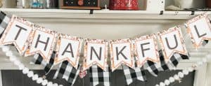 Thankful Thanksgiving banner over mantel